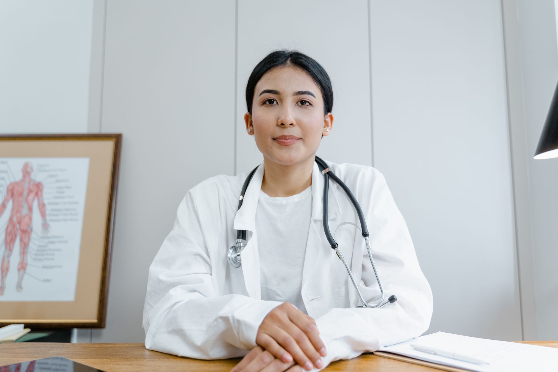 A clinician with a patient